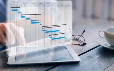 Project,Manager,Updating,Progress,And,Deliverables,Milestones,Schedule,On,Gantt