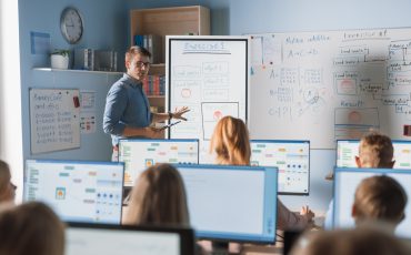 Blog 4 Elementary,School,Class:,Teacher,Uses,Interactive,Digital,Whiteboard,,Explains,Lesson